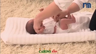 آموزش پوشیدن لباس نوزاد